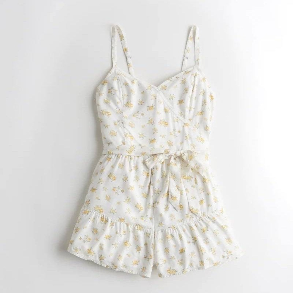 Yellow and white floral romper never worn